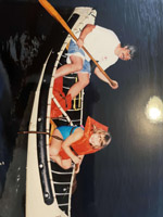 father and daughter in a canoe
